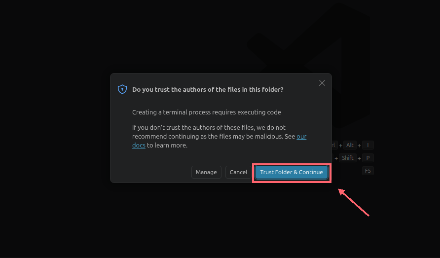 Aviso de confiança do VS Code; Trust Folder & Continue está contornado em coral e indicado por uma seta.